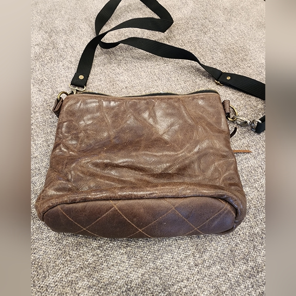 Brown leather crossbody bag made from upcycled leather!